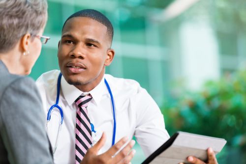 Doctor meeting with senior patient