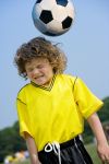 Boy heading soccer ball - possible CTE / Head injury