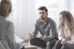 Spouses with problems talking to a counselor