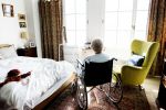 Senior woman sitting on a wheelchair